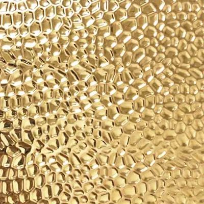 Bon prix La couleur d'or a gravé le modèle en refief de nid d'abeilles de feuille d'acier inoxydable en ligne